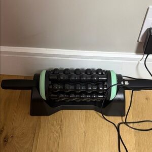 Black and Green Electronic Muscle Roller